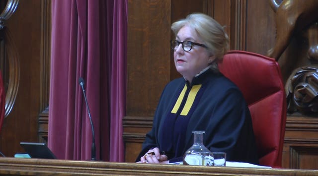 Lady Chief Justice Baroness Carr sitting at the Royal Courts of Justice