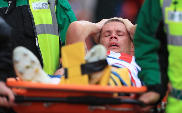 Stoke's Ryan Shawcross is stretchered off injured during the pre-season friendly against Leicester