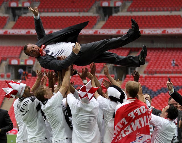 He would then celebrate promotion to the top flight with the Swans following their Wembley victory over his former club Reading 