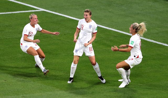 Ellen White celebrates her equaliser against the United States