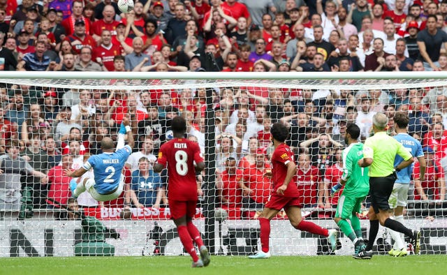 Kyle Walker clears Mohamed Salah's header off the line 