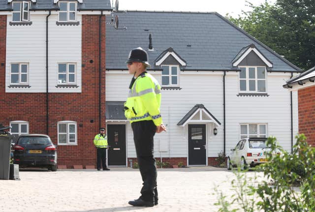 Police activity outside a block of flats on Muggleton Road in Amesbury