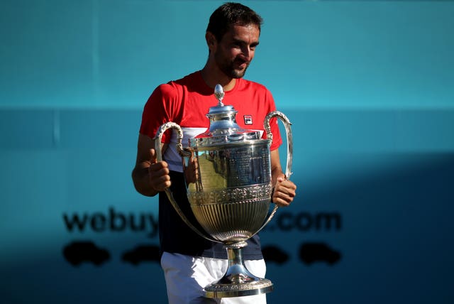Croatia’s Marin Cilic with the 2018 Fever-Tree Championship trophy (PA)