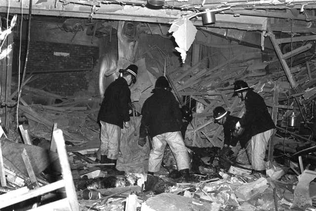 Firemen at work following the bombings