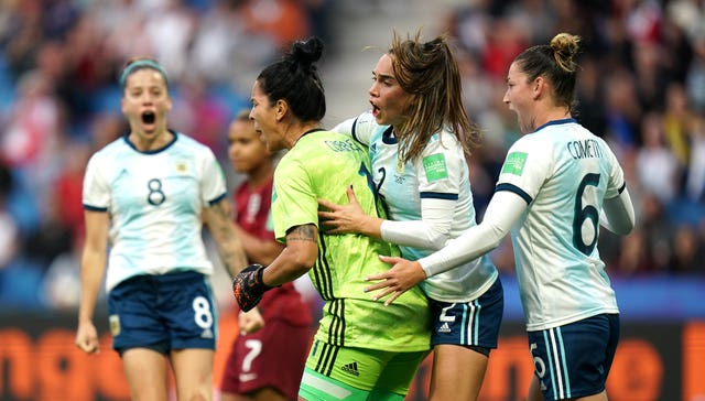 Vanina Correa, centre, celebrates after saving the penalty against England
