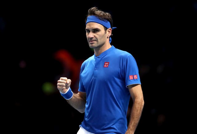 Roger Federer celebrates his victory over Dominic Thiem (Adam Davy/PA).