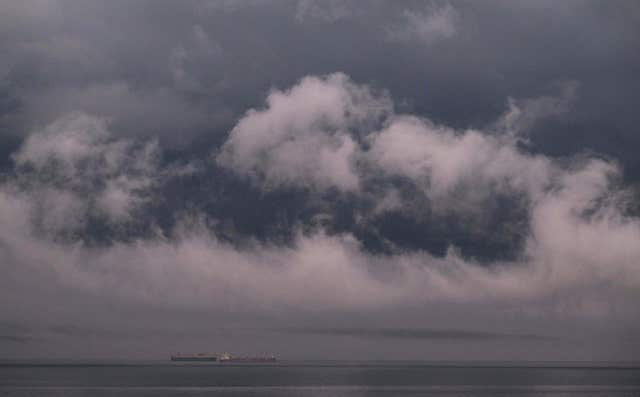 Storm clouds form over Whitley Bay in the North East of England (Owen Humphreys/PA). 