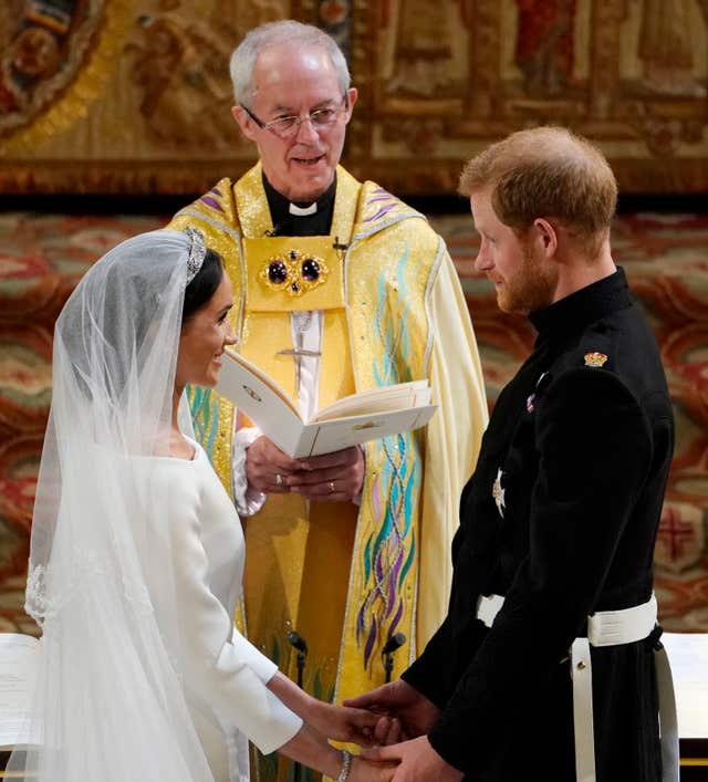 The dress was designed by British designer Clare Waight Keller (Owen Humphreys/PA)