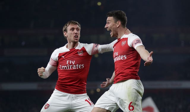 Monreal celebrates a goal for Laurent Koscielny in the win over Bournemouth