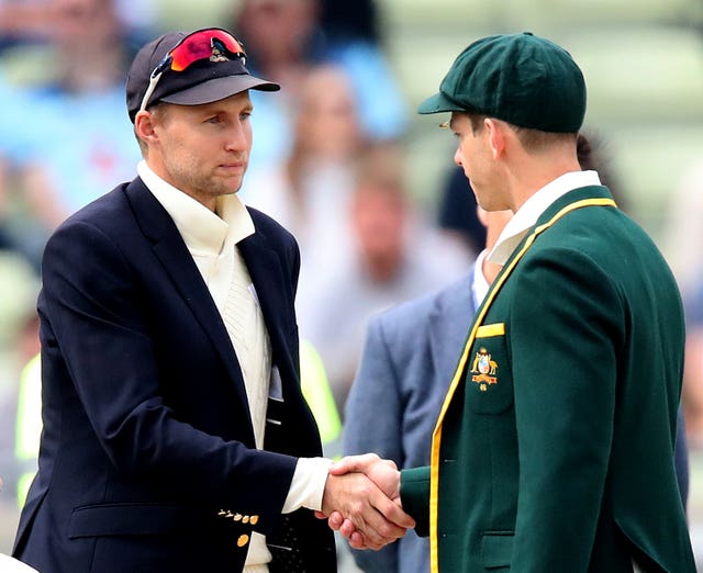 Joe Root, left, shakes Tim Paine's hand at the toss 