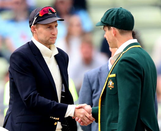 Joe Root, left, shakes Tim Paine's hand at the toss