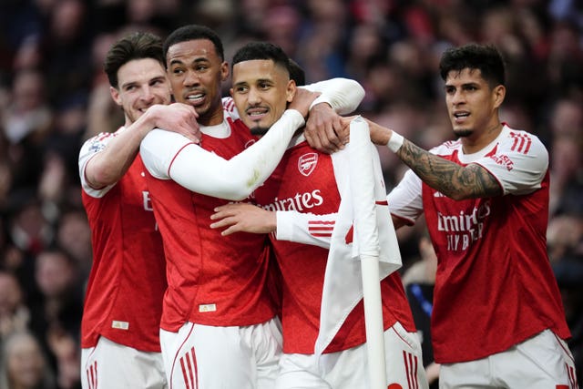 Arsenal’s William Saliba (second right) celebrates with his team mates after scoring his sides first goal during the Premier League match at the Emirates Stadium, London. v Chelsea – Premier League – Emirates Stadium