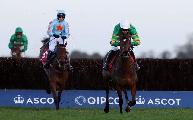Defi Du Seuil (right) on his way to winning last year's Clarence House Chase