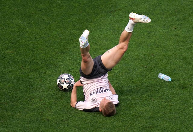 Kevin De Bruyne stretches during a training session on Friday