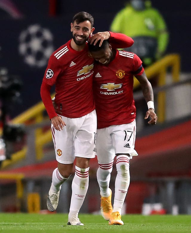Manchester United's Bruno Fernandes (left) celebrates scoring his side's first goal of the game with team-mate Fred