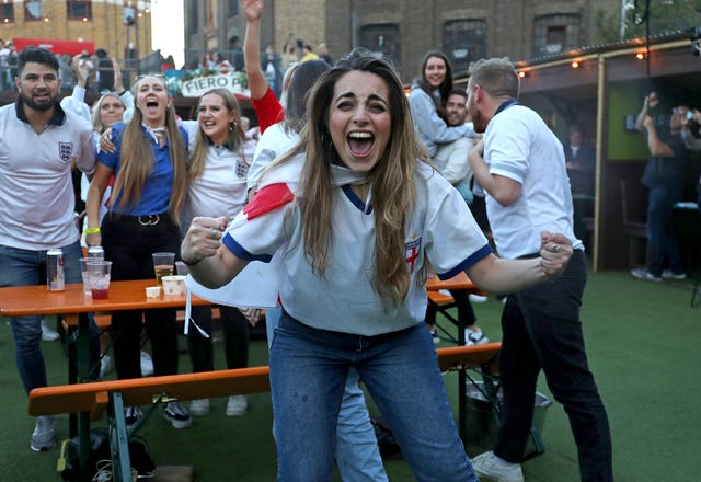 England fans celebrate at the Vinegar Yard in London 