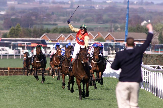 Paul Carberry crosses the line to win the National on Bobbyjo