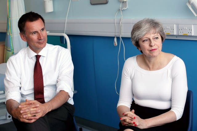 Theresa May and Jeremy Hunt (Christopher Furlong/PA)