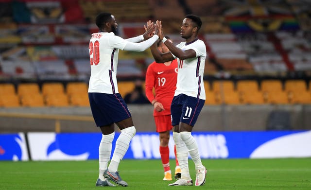 England's Ryan Sessegnon (right) celebrates after Turkey's Huseyin Turkmen scores an own goal 
