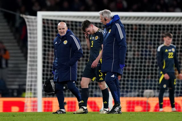 Scotland’s Andrew Robertson walks off injured