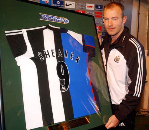 Alan Shearer is presented with a Newcastle/Blackburn half-and-half shirt after scoring 100 Premier League goals for each club