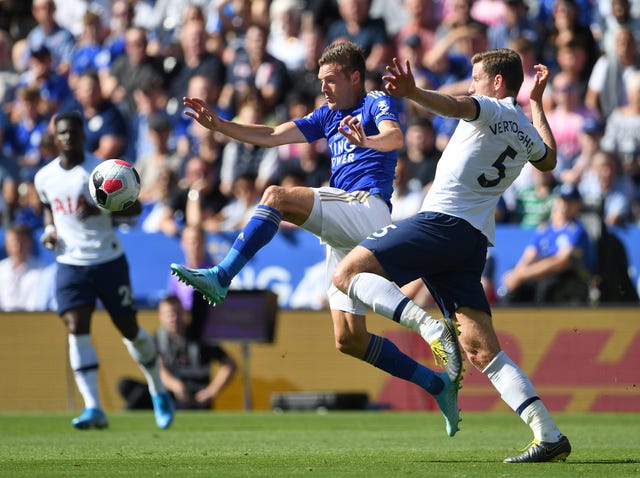 Jan Vertonghen, right, battles for possession with Leicester's Jamie Vardy