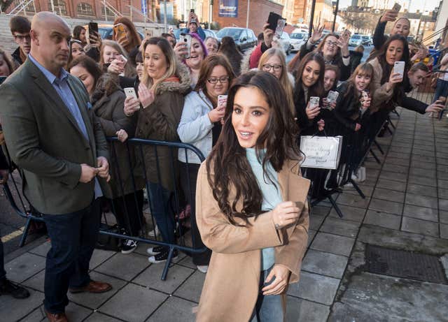 Fans gathered to see Cheryl arrive at the centre (Danny Lawson/PA)