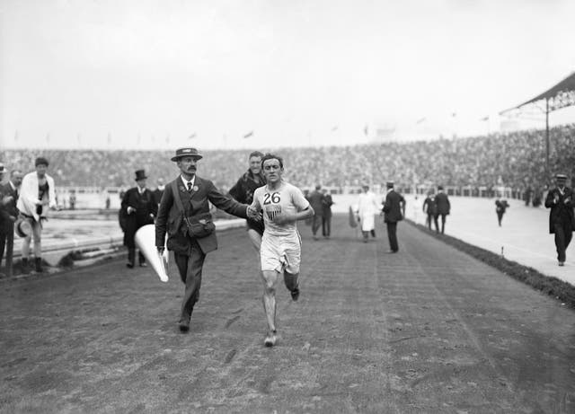 Johnny Hayes completes the marathon at the 1908 London Olympics