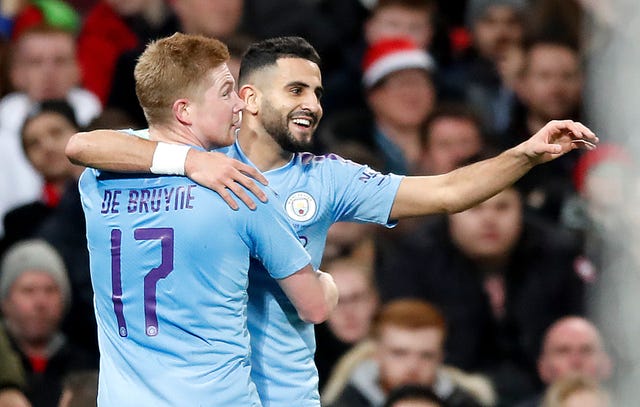 Kevin De Bruyne celebrates Manchester City's second goal with Riyad Mahrez
