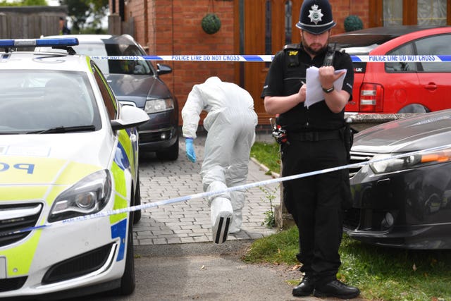 Forensic officers at the scene