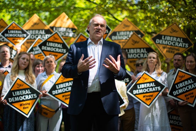 Sir Ed Davey speaks in front of Liberal Democrat supporters