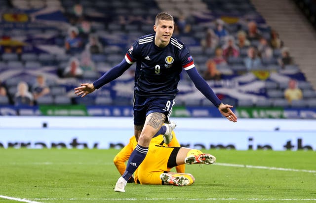 Lyndon Dykes celebrates scoring Scotland's winner