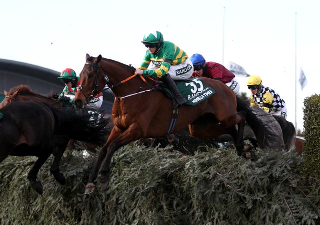 Minella Times powered over the famous fences