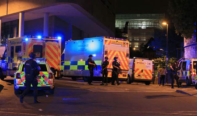 Armed police at Manchester Arena (Peter Byrne/PA)