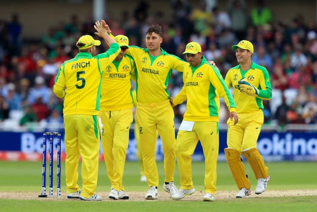 Marcus Stoinis, centre, celebrates dismissing Shakib Al Hasan