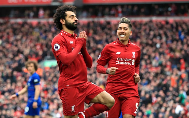 Liverpool’s Mohamed Salah celebrates scoring his side’s second goal of the game against Chelsea