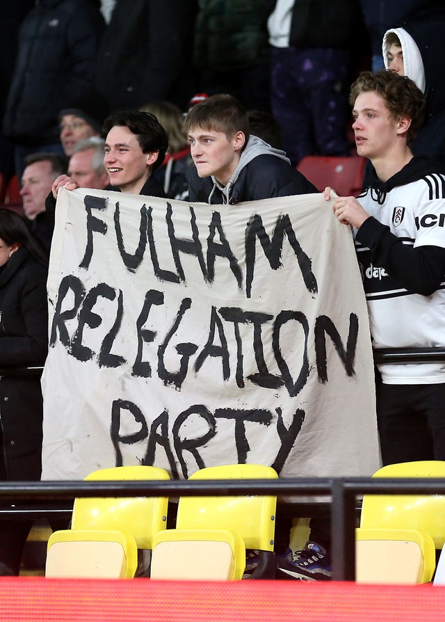 Fulham fans with a banner during the match at Watford