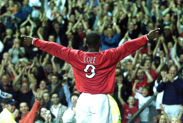 Andy Cole celebrates a goal for Manchester United