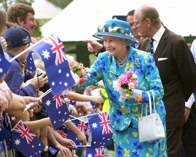 Philip joins the Queen to greet wellwishers in Australia