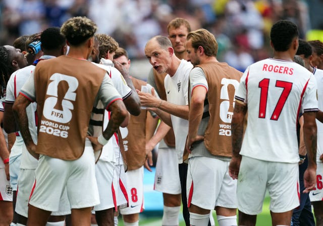 Thomas Tuchel, centre, talks to his England team during the World Cup third-place play-off against France