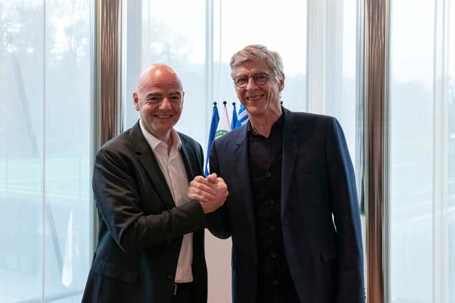 Arsene Wenger, right, with FIFA president Gianni Infantino