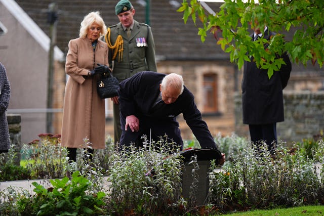 The King laying a wreath at Aberfan Memorial Garden