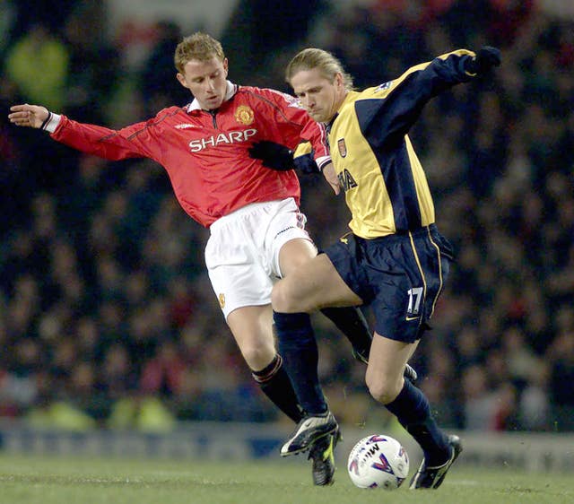 Petit (right) came up against Manchester United as an Arsenal player when the two clubs were battling for major honours.