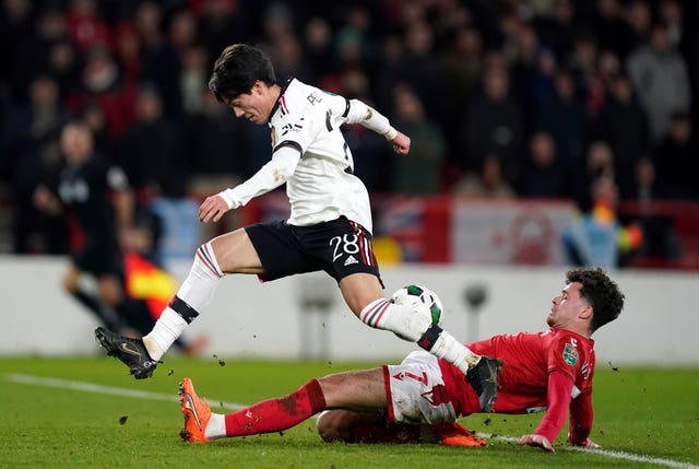Manchester United's Facundo Pellistri is challenged by Nottingham Forest's Neco Williams