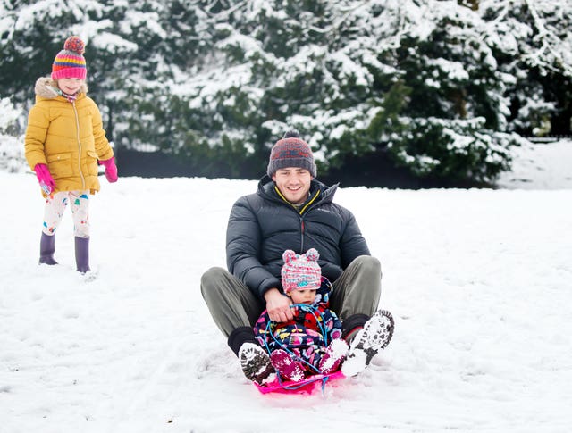 People enjoy the snow in Buxton