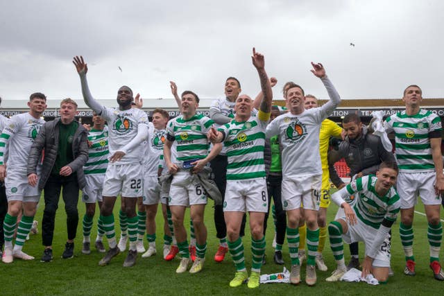 Celtic clinched their eighth successive title with victory at Aberdeen 