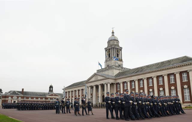 Officers and airmen and airwomen parade at the joint graduation ceremony