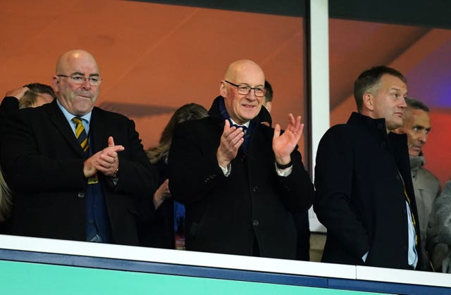John Swinney clapping from the stands