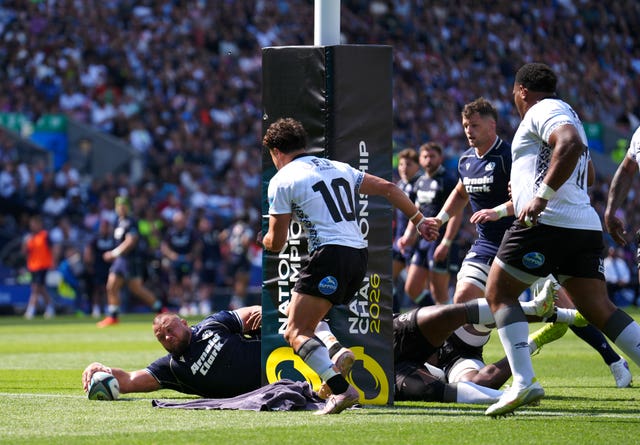 Pierre Schoeman scores a try for Scotland
