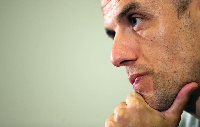 Phil Neville has strong ties to Bury